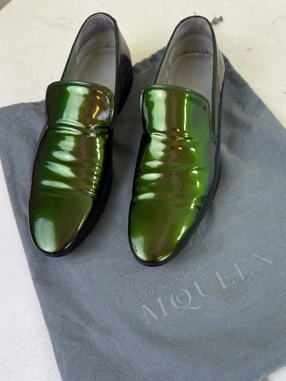 ALEXANDER MCQUEEN SLIP-ON LOAFERS IN METALLIC GREEN PATENT LEATHER